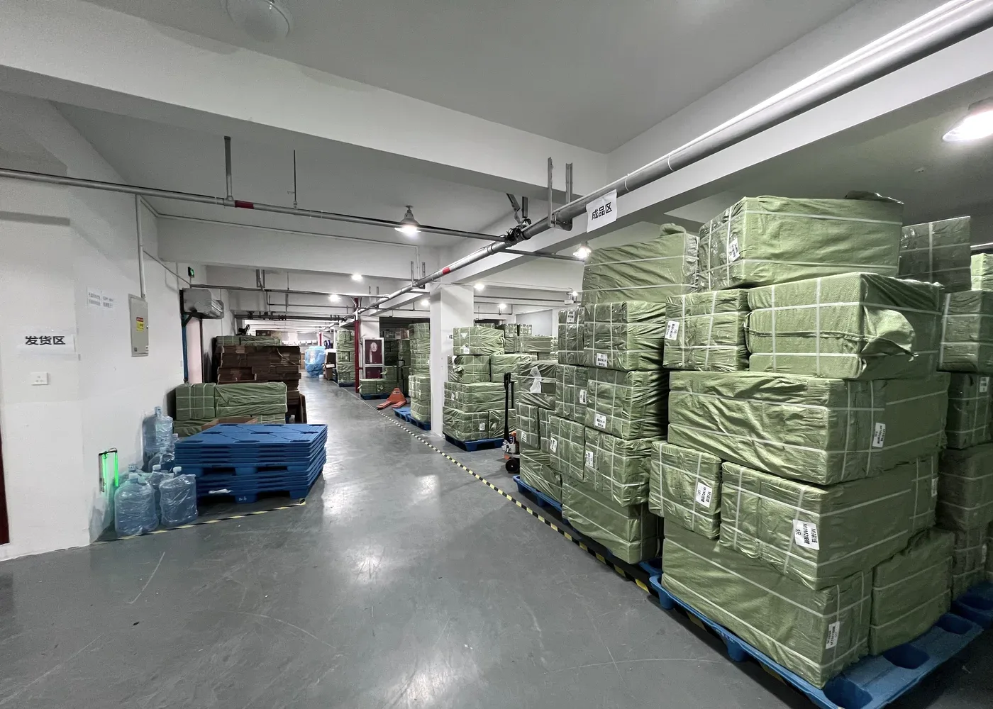 Shipping area with pallets of packed orders ready for worldwide dispatch
